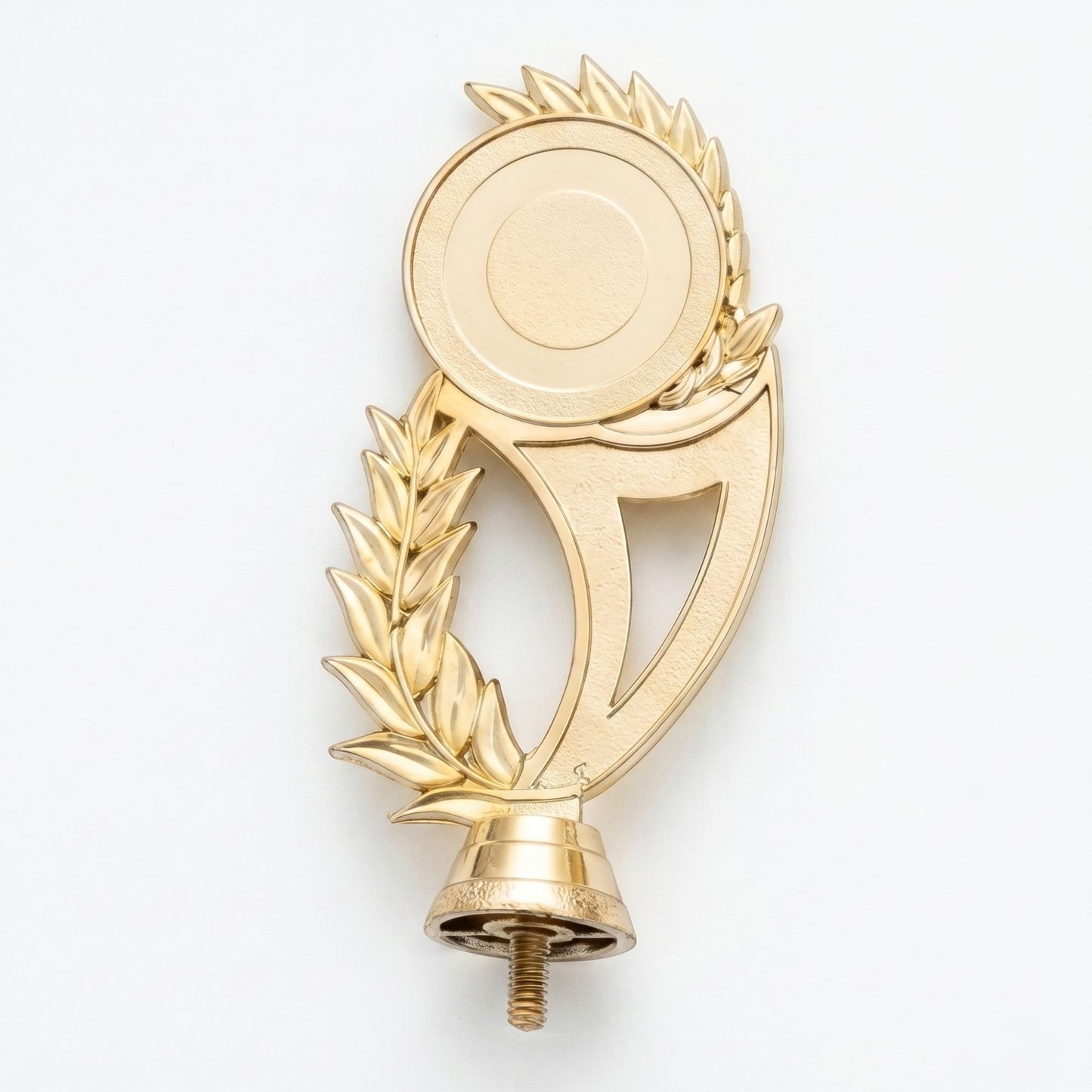 A shiny gold trophy topper insert component featuring a minimalist circular emblem disc framed beautifully by an asymmetric laurel leaf branch design.