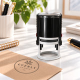 Custom round self-inking stamp for personalized business logos, product packaging, and branded kraft tags.