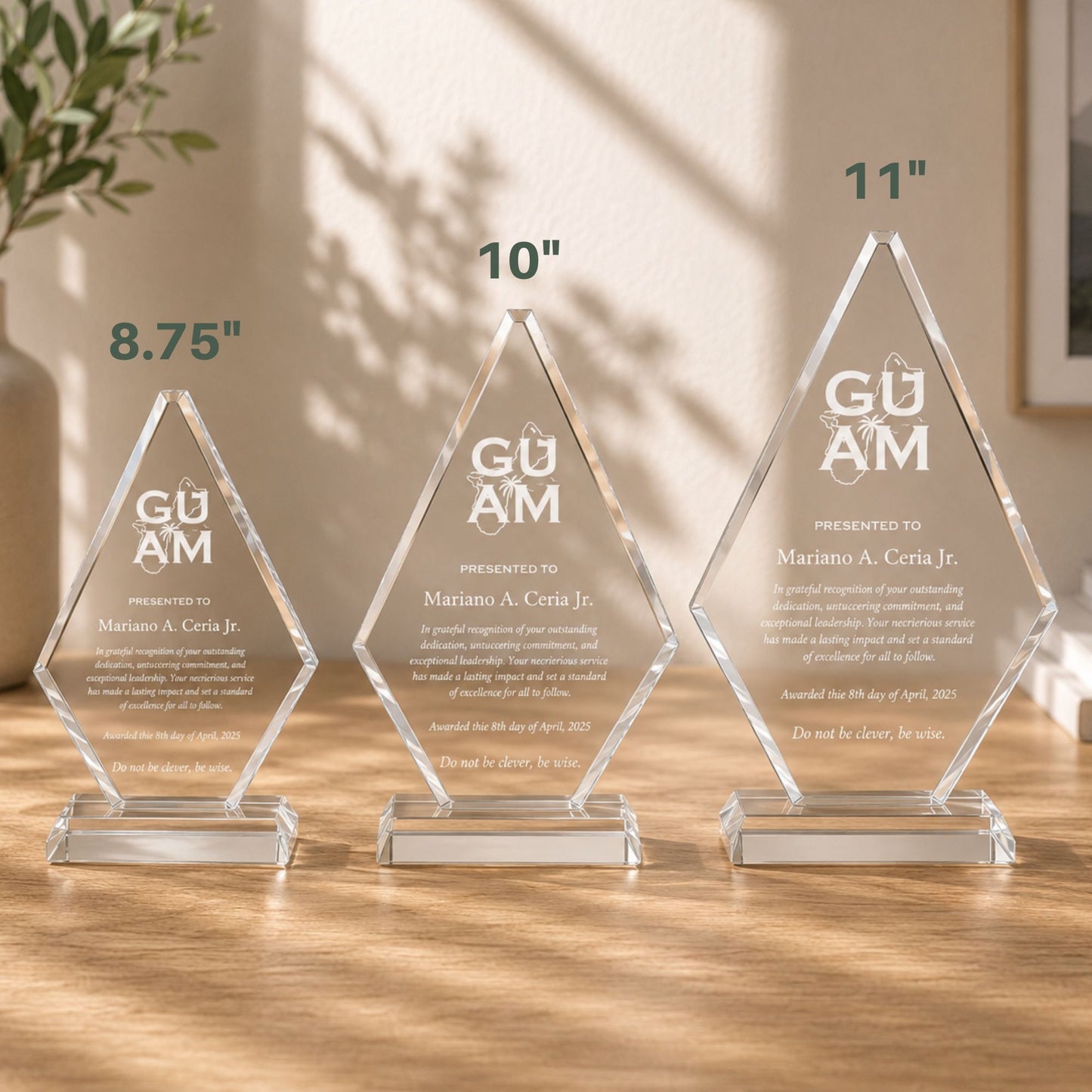 Premium diamond-shaped crystal awards available in three sizes, beautifully engraved and displayed in a luxury daylight lifestyle setting.