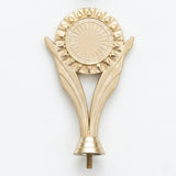 Modern V-shaped gold victory topper with a central sunburst emblem holder.