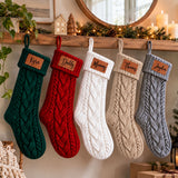 Matching personalized family Christmas stockings in coordinating holiday colors for a festive fireplace mantel display.