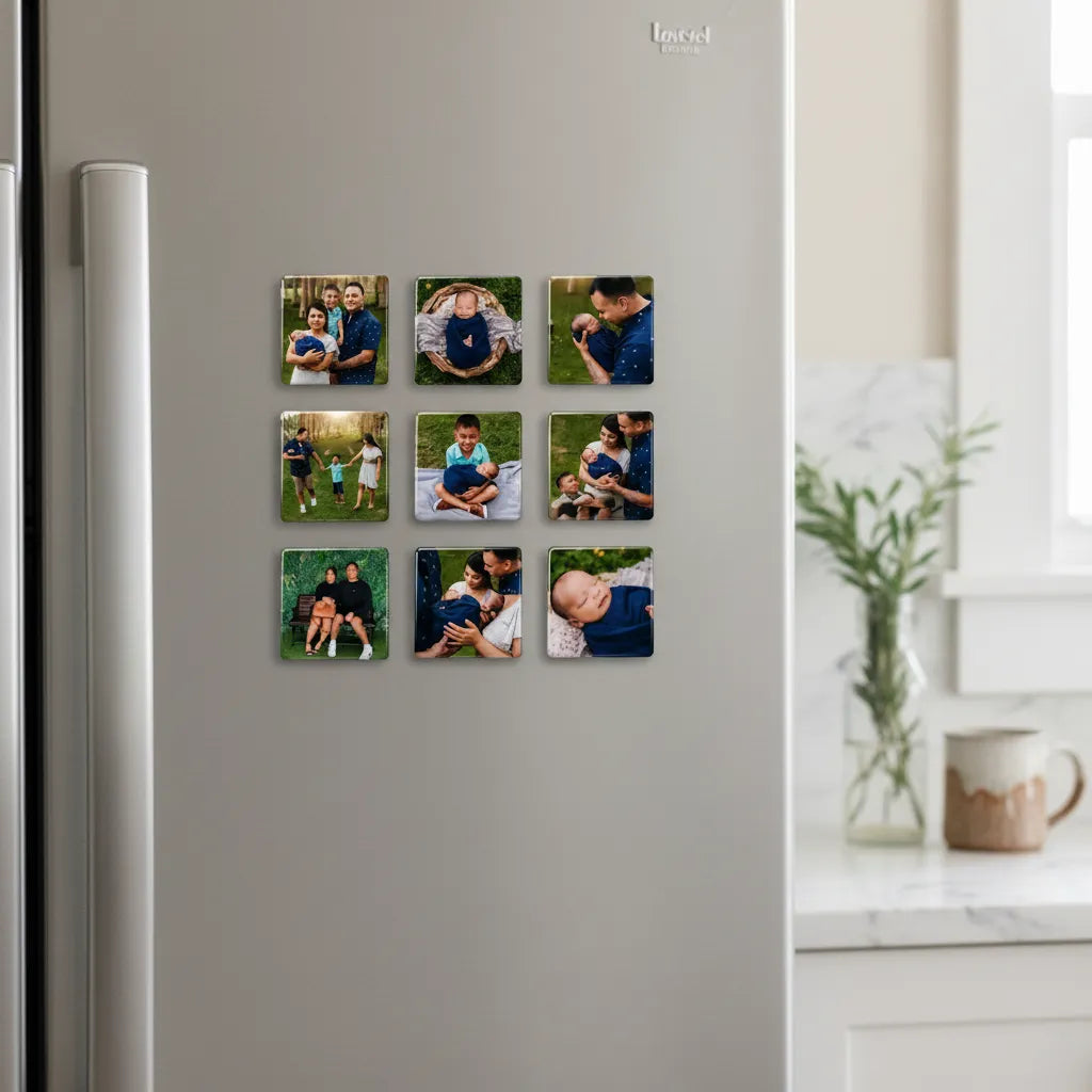 A neat three-by-three grid layout of nine large 2.5 inch personalized square glossy family photo magnets mounted on a clean white refrigerator door next to a small kitchen countertop vase.