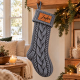 Personalized gray Christmas stocking with name in a cozy cable-knit style for customized holiday decor.