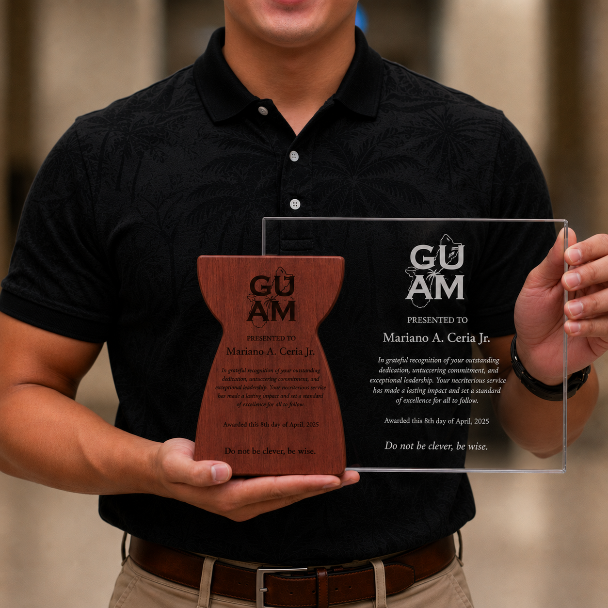 A man in a black polo shirt holding the custom personalized crystal glass and wooden latte stone recognition award, showcasing the clean white engraved lettering up close.