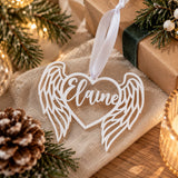 Personalized white angel wing Christmas ornament with custom name, a thoughtful memorial keepsake and holiday decoration.